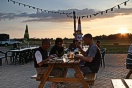 After a day's jumping, having a beer at sunset