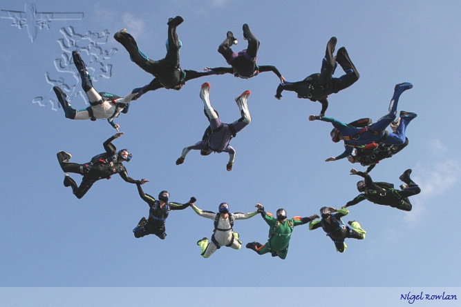 Dave Hartley's 1000th as he is circled by his mates