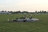 Children playing, Skyvan in the background