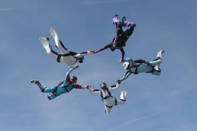 Headcorn fs jumpers performing a 5 way star in July 2006