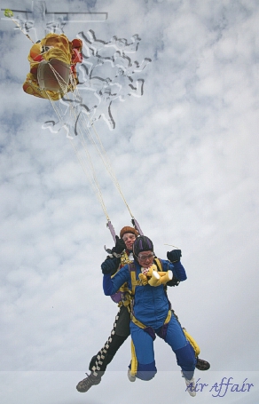 Mike deploying the main tandem canopy after the freefall, spot the teddy bear.