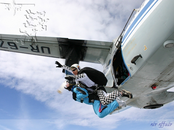 Mike Milton exits the Turbolet airplane with his passenger Debbie Hole.