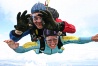 Tandem instructor Clem in freefall with Annette - we're having a ball!