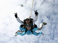 Instructor Mike Milton and passenger Debbie Hole with the Turbolet aircraft in the background.