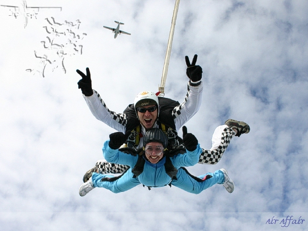 Instructor Mike Milton and passenger Debbie Hole with the Turbolet aircraft in the background.