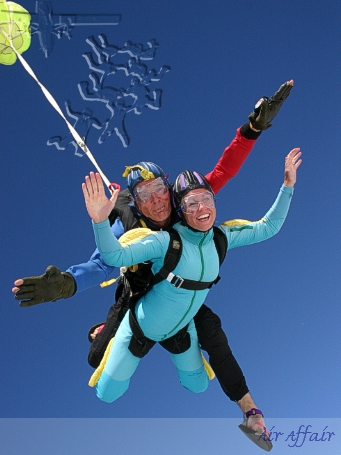 Instructor Clem skydiving with passenger Annette - looks like he's having a ball again!