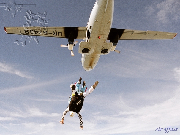 Skippy jumps from the Turbolet aircraft.  You can tell from the stripes the parachute they're wearing is a French Atom.