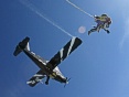 This is a stuning photo taken just after exiting the Black Beaver aeroplane, Mike jumping an Atom.