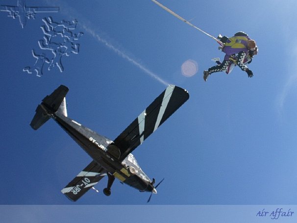 This is a stuning photo taken just after exiting the Black Beaver aeroplane, Mike jumping an Atom.