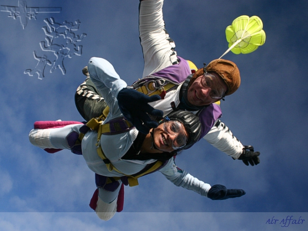 Tandem master Mike in freefall with tandem passenger Rachel Rodriguez.