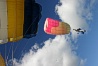 Flying the main parachute back, Squaddy's "Stiletto" canopy on the left is a third of the size of the "Hop" tandem.