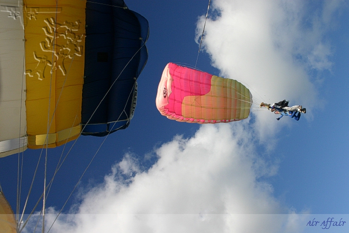 Flying the main parachute back, Squaddy's "Stiletto" canopy on the left is a third of the size of the "Hop" tandem.